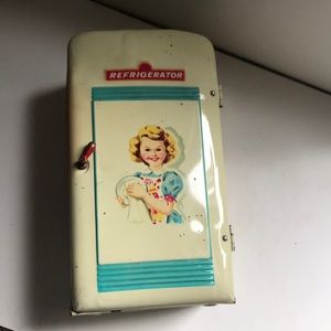 Vintage metal toy refrigerator.